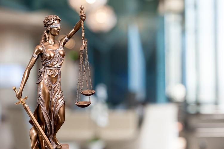 Statue Of Lady Justice In An Office