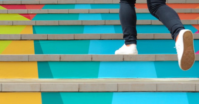 Woman · stairs going upward