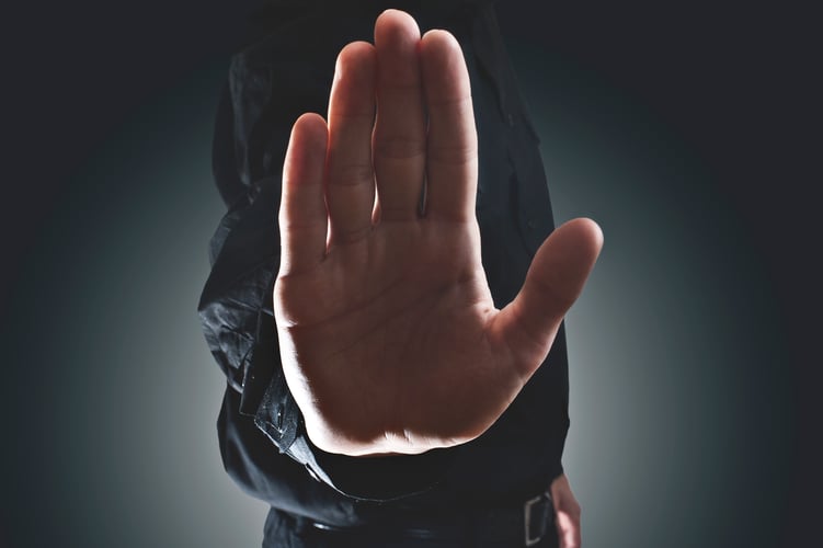 Stop hand sign