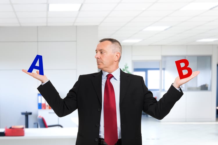 Confused businessman trying to make a decision