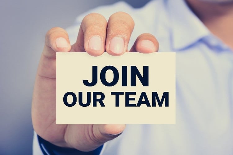 Recruiter holding a card