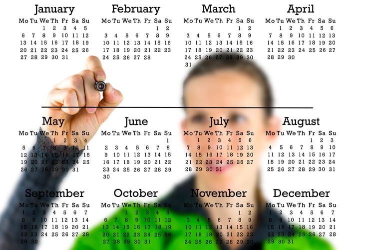 Virtual calendar with a woman writing in copyspace