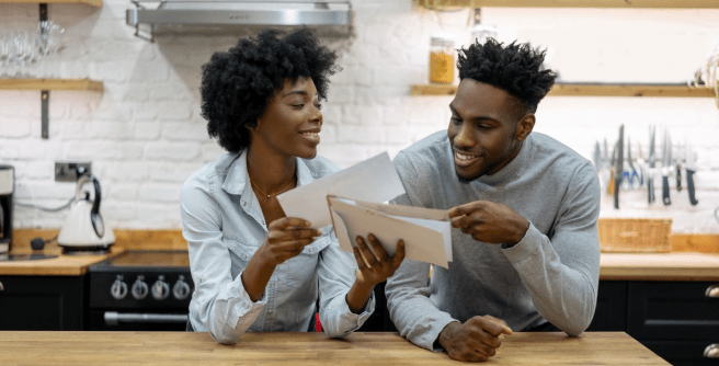 A couple discovering their 401(k) safe harbor automatic enrollment notices.