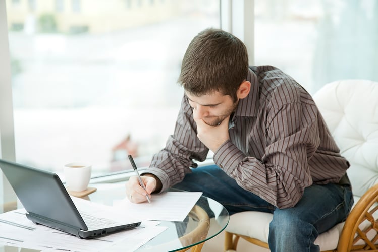 Guy working on establishing his retirement plan committee charter