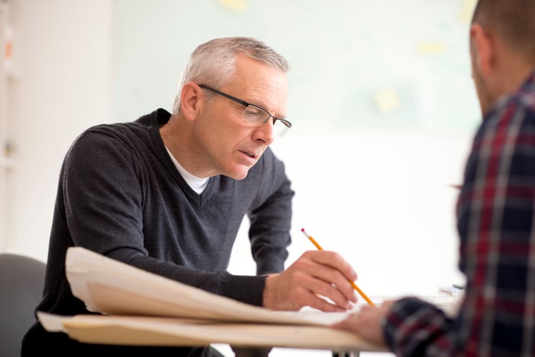 An advisor going over plan eligibility