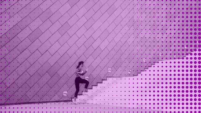 Woman running up to her to her financial goals