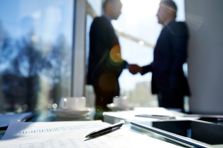 business people shaking hands