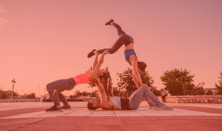 people doing yoga outside