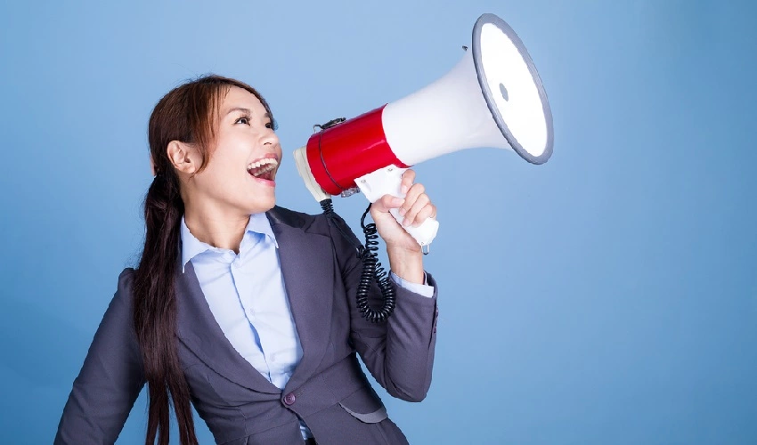 Woman with a megaphone notifying her clients of a fund change